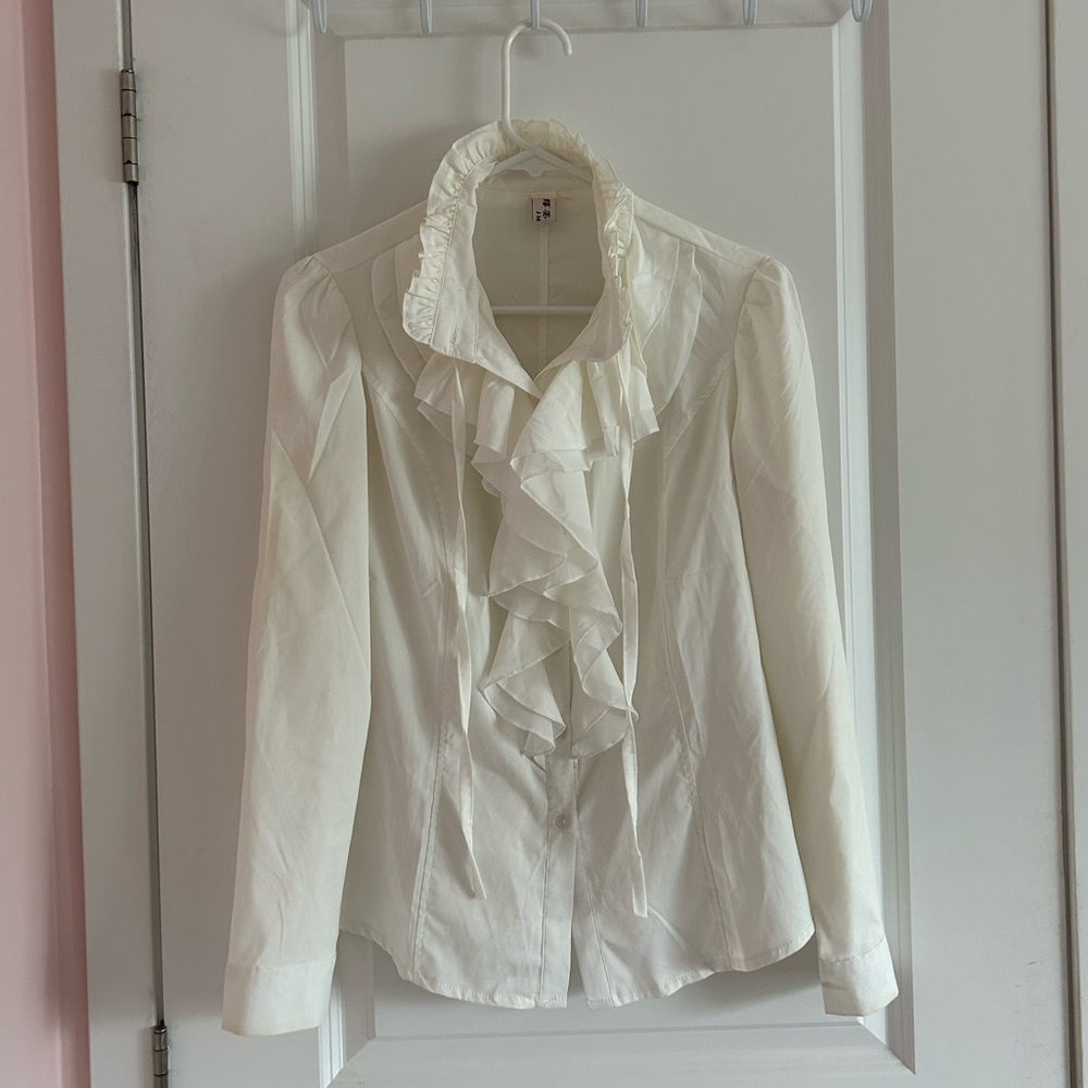 horror protagonist ruffle button down blouse